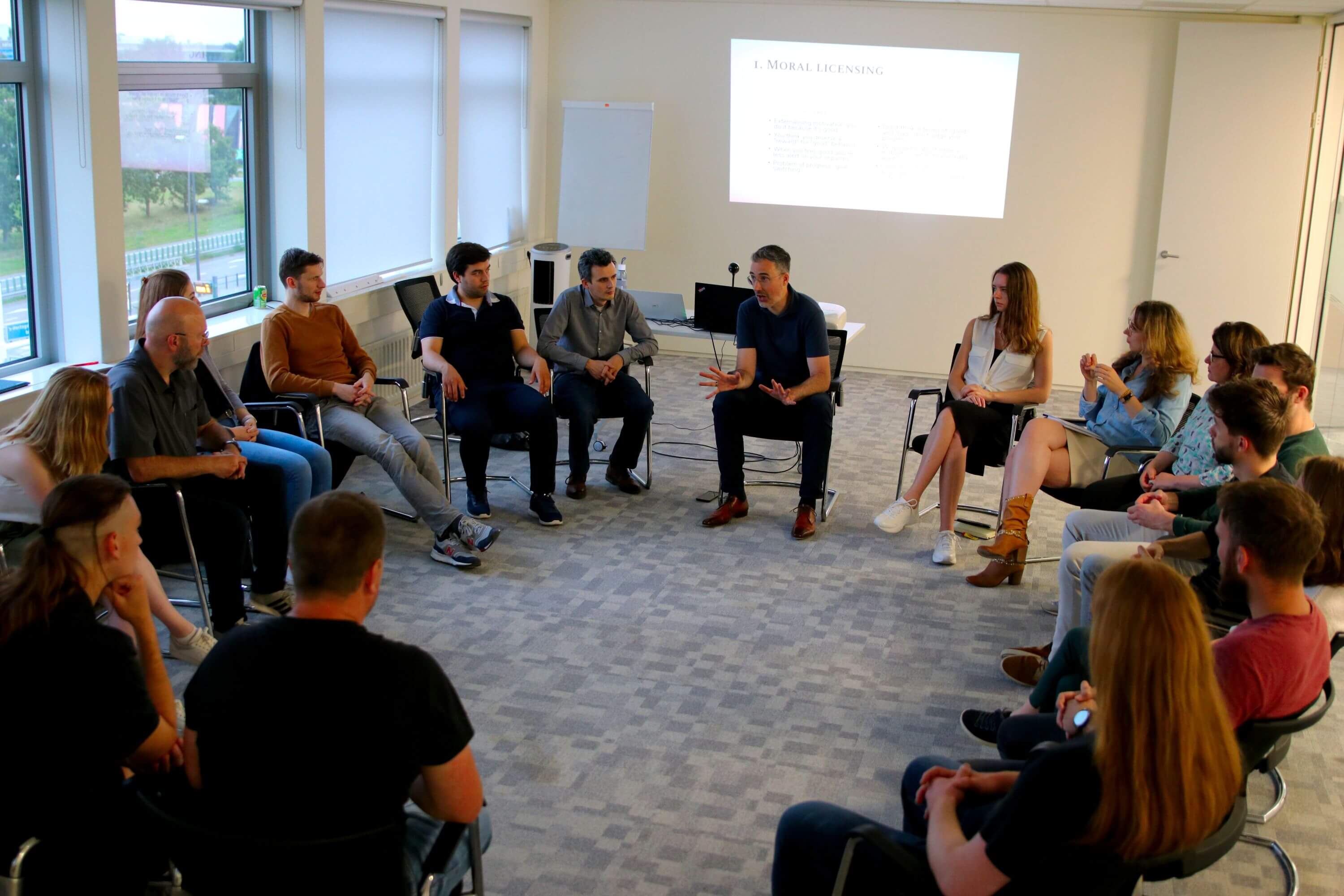 Imre Végh facilitating a leadership coaching circle session with participants